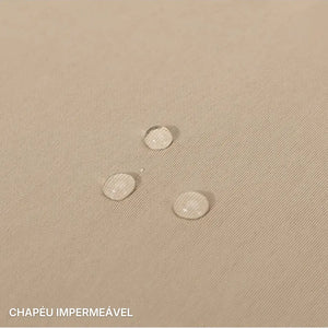 Chapéu de Pesca Zanter Outdoor Pro mostrando que seu tecido é impermeável, com gotas de água em sua superfície