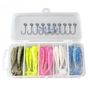 Kit de Isca Artificial Shad de 36 peças coloridas com jigheads, organizadas em estojo plástico transparente com tampa aberta.