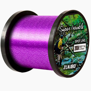 Carretel da Linha Monofilamento Zukibo Super Invisible na cor roxa em foco, visto de lado