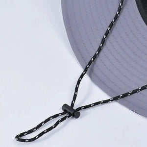 Cordão de ajuste do quiexo do Chapéu de Pesca Zanter Camo Trek em foco