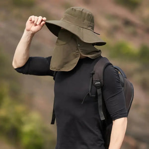 Um homem visto de lado usando o Chapéu de Pesca Zanter Expedition Pro na cor verde que vem com proteção de rosto e nuca