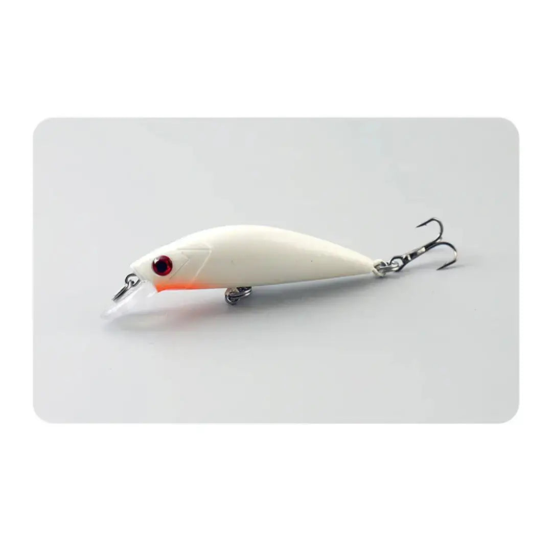Isca tipo minnow do Kit Isca Artificial Minnow Wave na cor branca vista de lado em fundo claro
