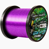 Carretel da Linha Monofilamento Zukibo Super Invisible na cor roxa em foco, visto de lado