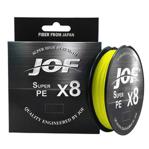 O Carretel da Linha Multifilamento JOF Pure na cor amarela em foco, com sua caixa ao lado