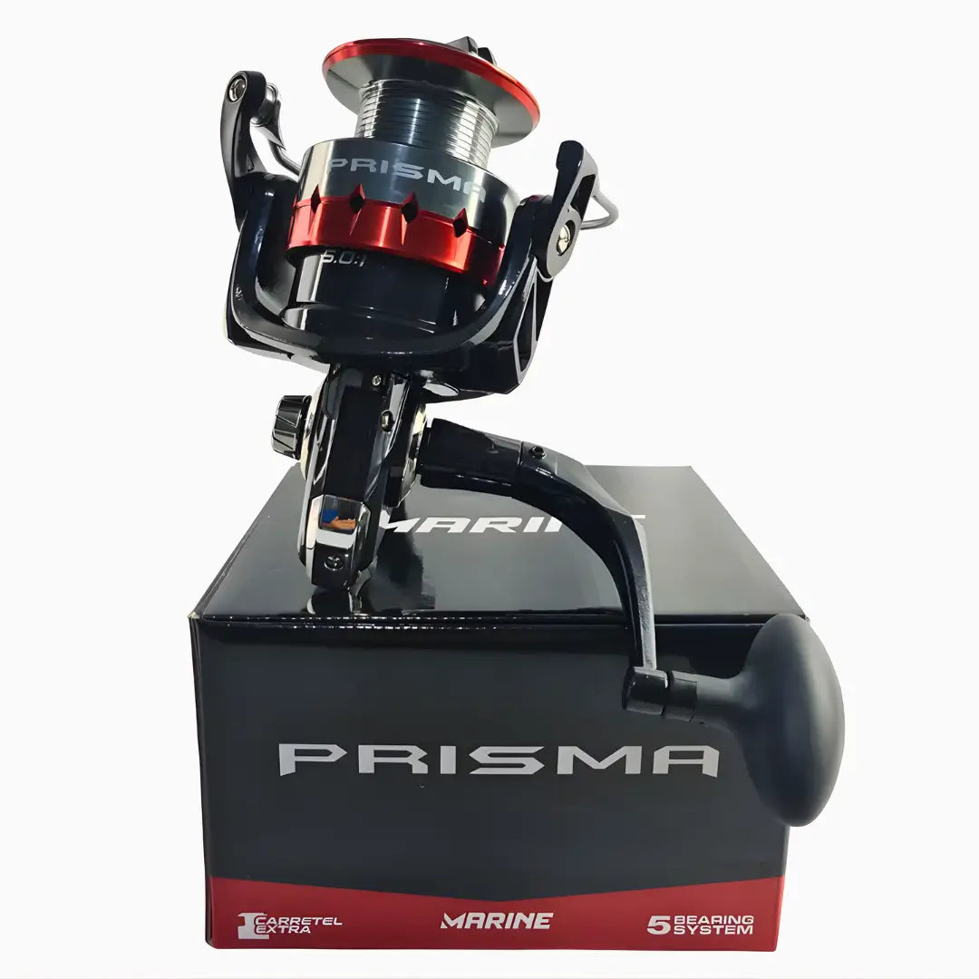 O Molinete Marine Sports Prisma em cima da sua caixa