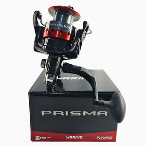 O Molinete Marine Sports Prisma em cima da sua caixa